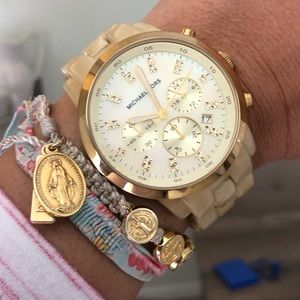 Round gold michael kors chronograph watch